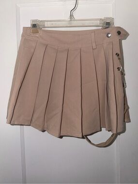 Lychee Pleated Mini Skirt With Adjustable Garter Strap in Tan